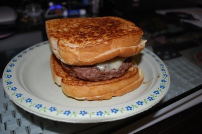 3/4 angle of grilled cheese bacon cheeseburger